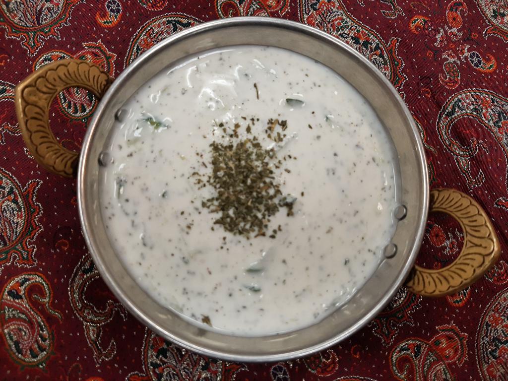 Yogurt Dip  · Mast-o-khiyar. Homemade yogurt with cucumber, onion, garlic and dry mint.