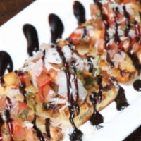 Bruschetta · Fresh oven-toasted bread topped with Roma tomatoes, basil, garlic, olive oil, balsamic vineg...
