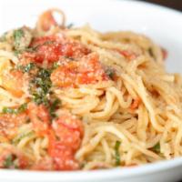 Pasta Pomodoro · Spaghetti, fresh tomato, basil, grated Parmesan & garlic.