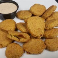 Fried Pickle Chips  · Breaded dill pickle chips, deep-fried, and served with a side of Cajun ranch dressing.