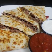 Steak Quesadilla · Shaved steak, mozzarella cheese, red & green bell peppers, and caramelized onions, with sals...