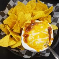 Bobby B’s Chili  · Beef chili, slowly simmered in house, topped with melted cheddar jack cheese, and served wit...