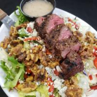 Hooligans Steakhouse Salad  · Mixed greens, sirloin medallion, roasted red peppers,
candied walnuts, bleu cheese crumbles,...