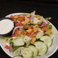 House Salad · Mixed greens, tomatoes, cucumbers, red onions, garlic croutons, choice of dressing. Can be m...