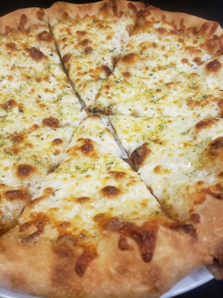 White Pizza  · Mozzarella, Italian herbs, garlic Parmesan drizzle.