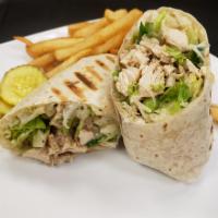 Chicken Caesar Wrap  · Grilled chicken breast, chopped romaine, shaved Parmesan, and creamy Caesar dressing in a pr...