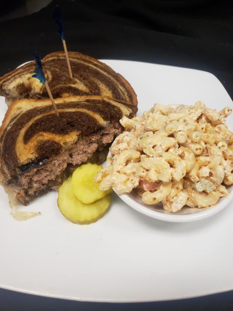 Patty Melt  · Melted Swiss on toasted marble rye with caramelized onions.