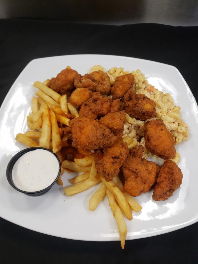 Boneless Wing Plate  · Our famous boneless wings tossed in your choice of wing sauce and served with a side of house made bleu cheese dressing.
