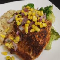 Seared Salmon ·  A 6 oz. Chilean salmon fillet, pan-seared with Cajun seasoning and topped with roasted corn...