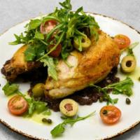 Roasted Chicken · Arugula, heirloom tomato vinaigrette, olive tapenade .