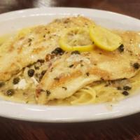 Chicken Picatta · Chicken breast sauteed with capers, white wine, and lemon butter sauce, served over angel ha...
