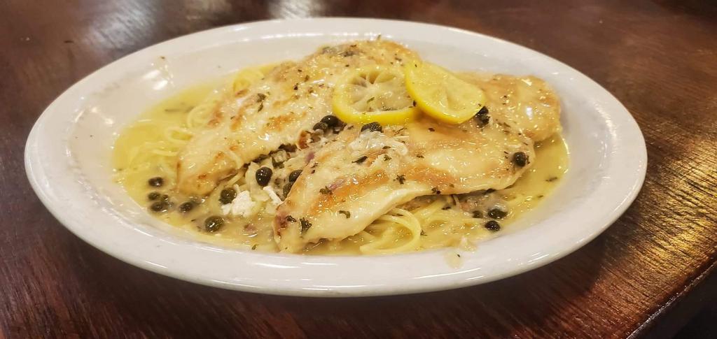 Chicken Picatta · Chicken breast sauteed with capers, white wine, and lemon butter sauce, served over angel hair pasta.