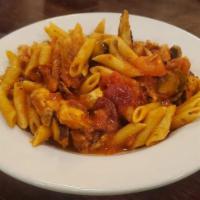 Chicken Arabiata · Chicken breast sauteed with mushrooms, hot cherry peppers, Roma tomatoes tossed with penne p...