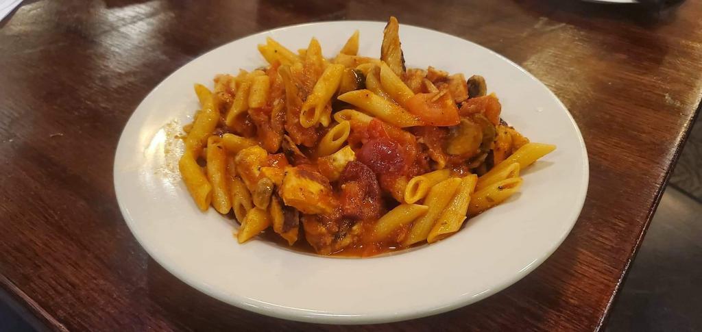 Chicken Arabiata · Chicken breast sauteed with mushrooms, hot cherry peppers, Roma tomatoes tossed with penne pasta in a white wine spicy marinara sauce.