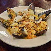 Linguine Pescatore · Mussels, clams, shrimp, and crawfish sauteed with white wine and olive oil, garlic, and basi...