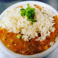 Creole Gumbo · Topped with rice.