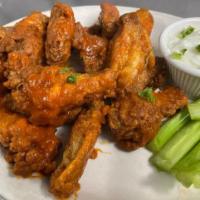 Buffalo Wings (8) · 8 wings served hot, medium, or mild.

JUNE 2021 - due to skyrocketing food costs, we are TEM...