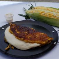 Sweet Corn Pancake  ( Cachapa de Queso de Mano ) · Served with hand made cheese. Thick and tasty pancakes made from maize.
