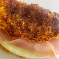 Ham and Cheese Sweet Corn Pancake ( Cachapa de Jamon y Queso de Mano ) · Served with ham and hand made cheese. Thick and tasty pancakes made from maize.