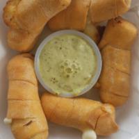 10 Cheese stick finger Venezuelan style  ( Tequenos Party ) · 10 small cheese sticks.