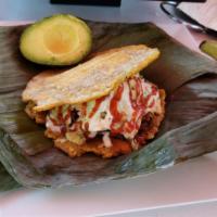 Combo Pataconero (Green Plantain sandwich) for 2 · 2 Patacones                 Green plantain sandwich, (1 Chicken, 1 Sayayin (mix of pork and ...