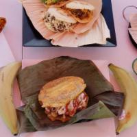 Super 6 Combo Arepas, Empanadas and Green Plantain sandwich, for 4 · 3 Arepas                      1 chicken, 1 shredded beef, 1 Pork
3 Patacones                ...