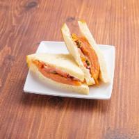 Wild Alaska Salmon Sandwich · Whole. Cream cheese, capers, red onion, and tomato.