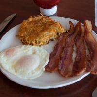 Thick Sliced Bacon and Eggs · 4 pieces of Richard Walker's special recipe thick sliced bacon. Served with 2 eggs and choic...