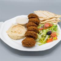 Falafel Platter · 6 pieces. Vegetable patties made from chickpeas, fava beans and spices served with hummus, h...