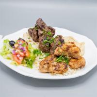 Mixed Platter · Chicken taouk, ground beef kafta and lamb shish kabob, served with hummus, house salad and b...