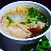 Wonton Soup · Chinese style with garlic, cabbage, scallions, and pork dumplings. Chicken broth.
