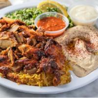 Chicken Shawarma Dinner ·  (gluten free option available) 
fire spit-roasted boneless, skinless, deep marinated chicke...