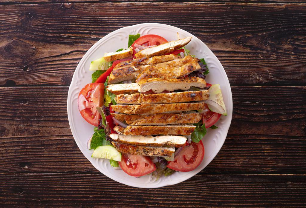 Grilled Chicken Caesar Salad · This naturally healthy, delicious salad consists of romaine let
tuce, tomatoes, cucumbers, peppers, onions, topped with charcoa
l grilled chicken with Caesar dressing.