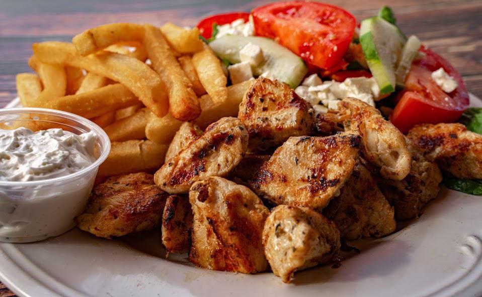 Chicken Souvlaki Dinner · Served with 2 sticks of tender cubes of chicken breast, french
fries or rice, Greek salad, pita bread and tzatziki sauce