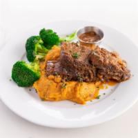 RED WINE BRAISED SHORT RIBS · slow cooked braised short ribs in au jus; served with chipotle mashed sweet potatoes & steam...