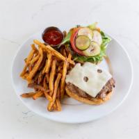 The (T) Burger · All-natural grilled turkey*, honey dijon mustard, mixed greens, tomato, house-made pickles, ...