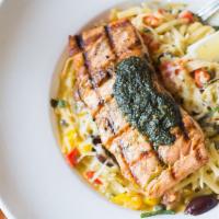 Grilled Salmon Pasta (GF) · Gluten-free angel hair pasta, grilled salmon* tossed with roasted tomatoes, red and yellow b...