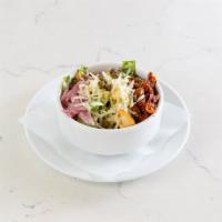 House Caesar Salad (VEG) · Tossed in creamy chipotle caesar dressing. Vegetarian.