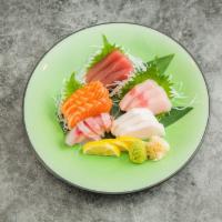 D05. Sashimi Regular · 15 pieces sashimi. with 3 tuna, 3 salmon , 3fluke, 3 seabass, 3 white tuna . Served with mis...