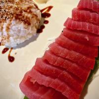 Tekka Don · 12 pieces sliced Tuna over seasoned rice. Served with soup and salad.