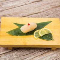 Scallop a la Carte · Cooked and seasoned mollusk