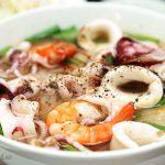 32. Hu Tieu Hai San · Rice noodles in pork broth with shrimp, squid, fish meatballs, and crab.  