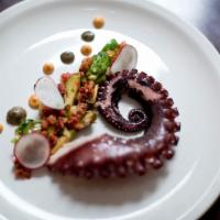 Adelita’s Pulpo · Crispy octopus, Brussels sprouts, pico de gallo, chorizo, avocado cream, and habanero aioli.