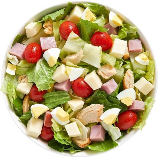 Bently Salad · Our Chef recommends a base of our Romaine/Iceberg Blend. It is served with Smoked Ham, Roasted Turkey, Provolone Cheese, Sliced Egg and Diced Tomatoes. We recommend our Green Goddess dressing.  All dressings will be served on the side.