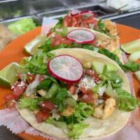 Chicken Tacos · 3 chicken tacos with cilantro and onios.
3 tacos de pollo con cilantro y cebolla. 
(Sauce on...