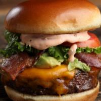 Classic Burger · 8 oz meat, cheddar cheese, brioche bread, lettuce, tomatoes and onions