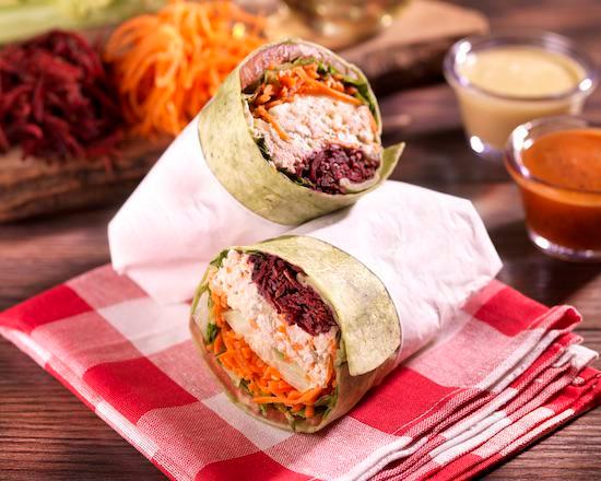 Veggie Wrap · Choose between spinach or whole wheat wrap. Comes with lettuce, tomatoes, cucumber, shredded carrots and shredded beets.