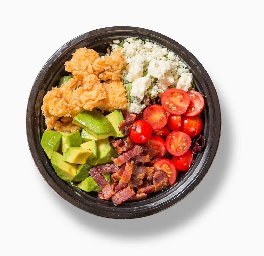 Crispy Chicken Salad · Organic greens, crispy chicken, avocado, bacon, bleu cheese, tomatoes and choice of dressing.