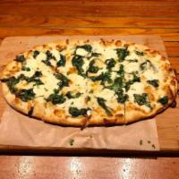 Spinach and Ricotta White Pie Pizza · Mozzarella, sauteed spinach, Ricotta, garlic oil drizzle.