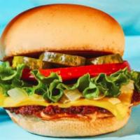 Veg-e-licious Burger (Vegetarian) · Veggie lovers favorite, veggie patty, house sauce, leaf lettuce, Roma tomato, pickles, shave...